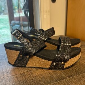 Volatile Black and Gold Wedge Sandals